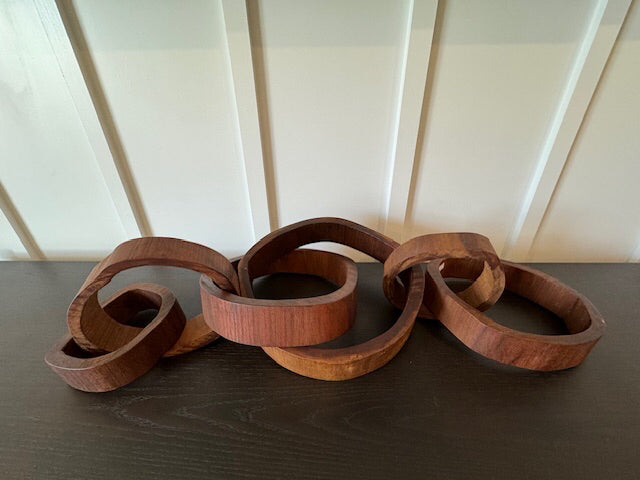Oversized wooden chain link, rust color, sculpture, 39â€