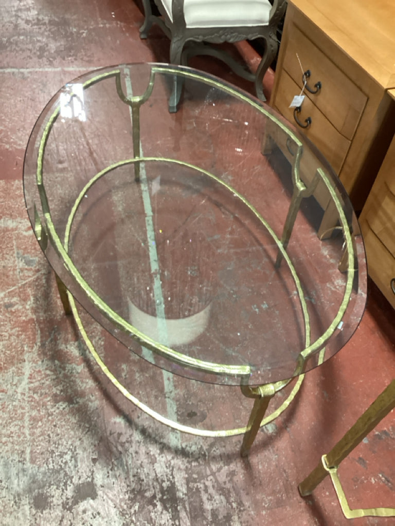 Coffee Table / Oval glass top / Hammered brass 48 x 32 AS IS ( chips in glass)