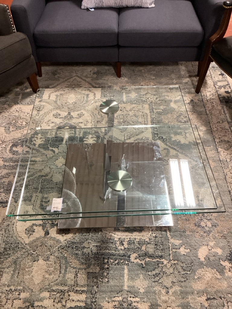 Glass Top Cocktail Table with Moving Tops