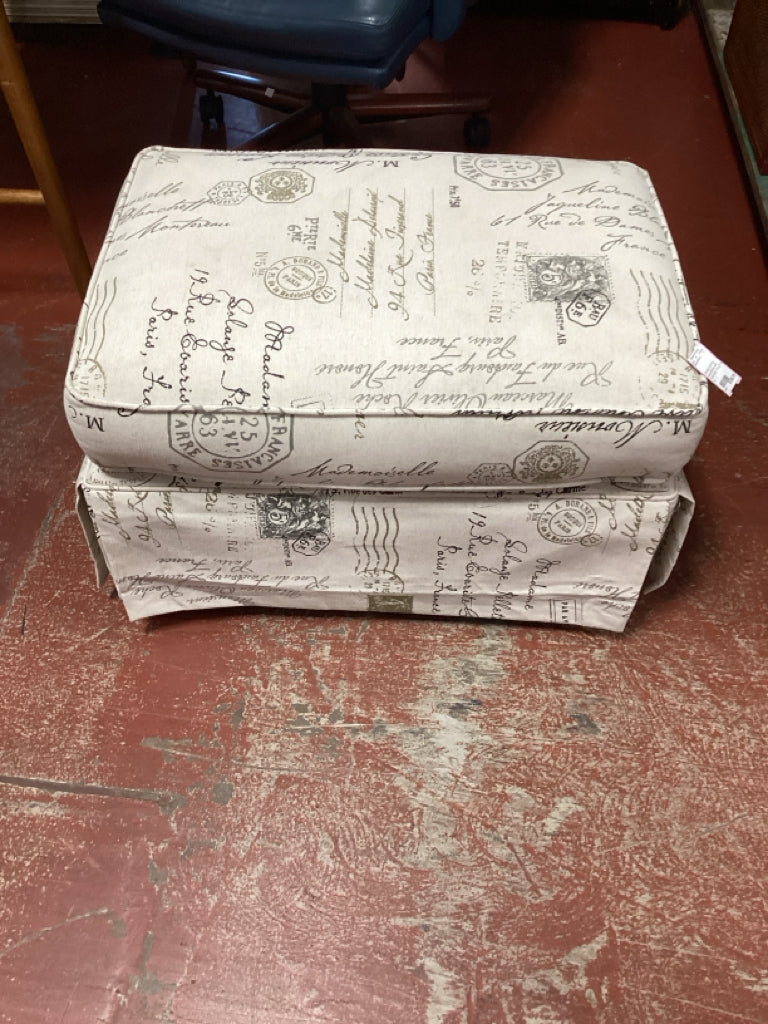 Ottomans / rocking cream ottoman with French script 19 x 27 x 18