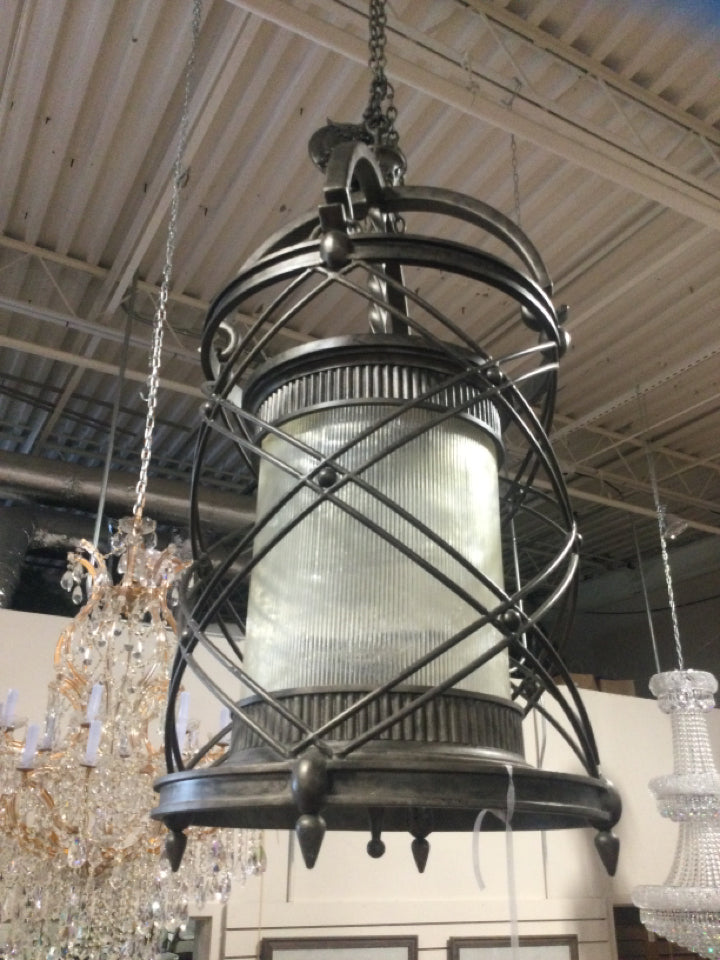 Chandelier/ rubbed bronze with fluted cylinder4 light 54h 24w  (#11)