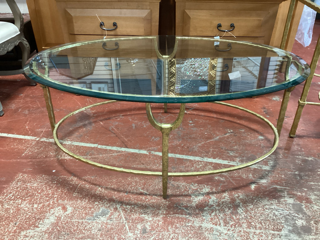 Coffee Table / Oval glass top / Hammered brass 48 x 32 AS IS ( chips in glass)