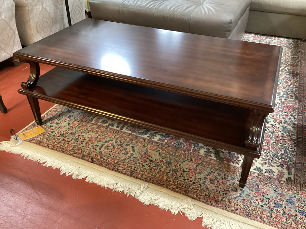 Charleston Maraschino Cherry Cocktail Table with Carved Accents  50.25"W x 29.25