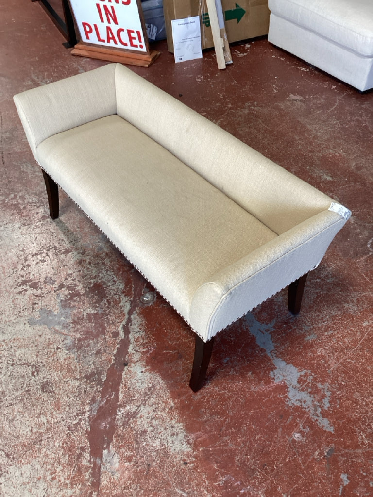 Bench / beige upholstered w/ nail head trim  50 x20 x23.5 high