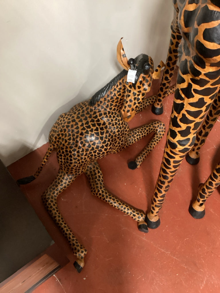 Leather wrapped baby giraffe sitting /  60 x 36 x 36 high