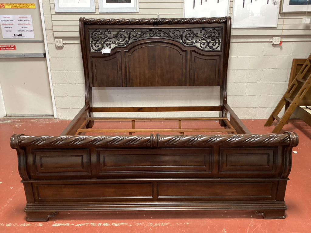 King Bed / Arbor Place Brownstone King sleigh bed w/ scroll iron accent