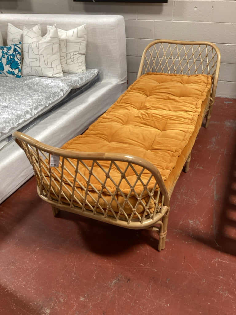 Urban Outfitters Rattan Day Bed / orange cushion  84 x 30 x 29 high