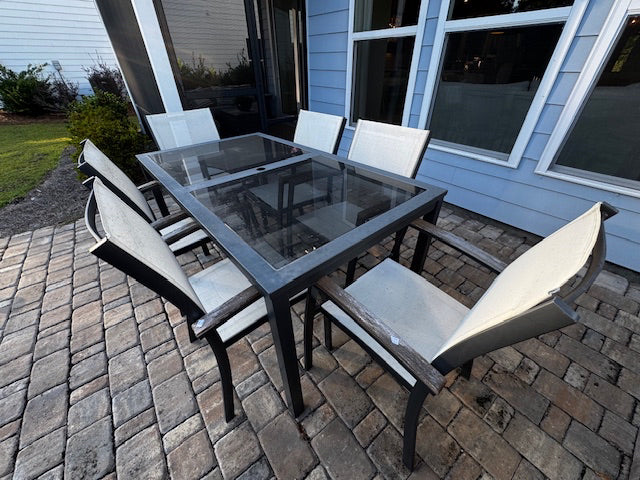 Outdoor glass top table w/ 6 cloth chairs; table:63x35x30