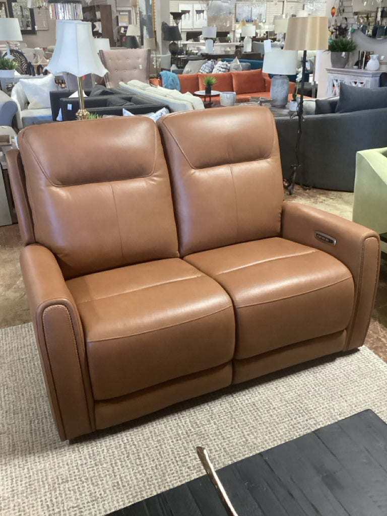 Leather Butterscotch reclining loveseat  46.50w 21.00D 20.25 Seat Height