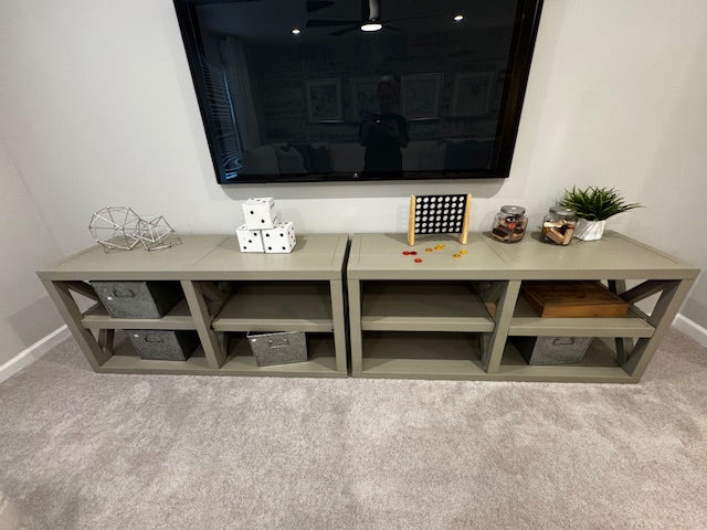 Grey media cabinet with shelf; 57x19x26