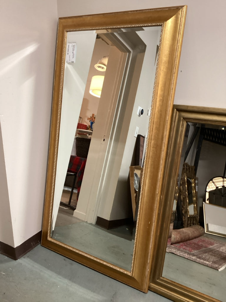 Mirror/ brushed gold frame with ornate trim 37 x 59